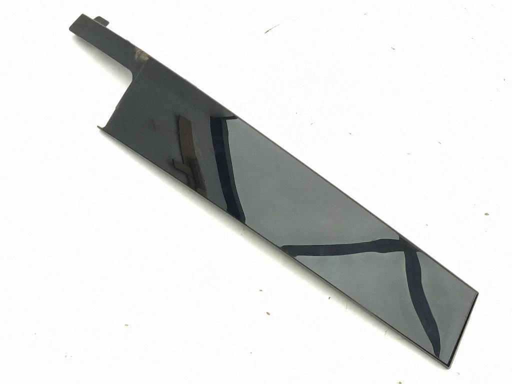 Front door glass trim molding 89A837901