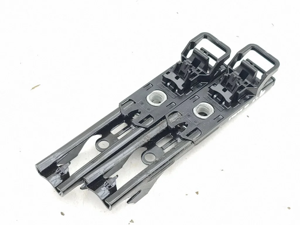 Seat belt adjustment rail