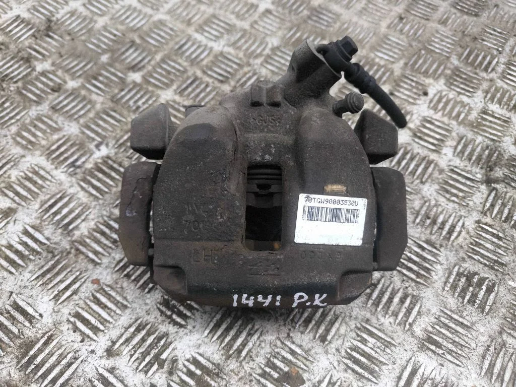 Front brake caliper – left