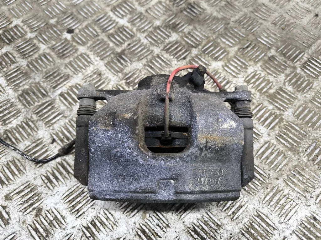 Front brake caliper – left
