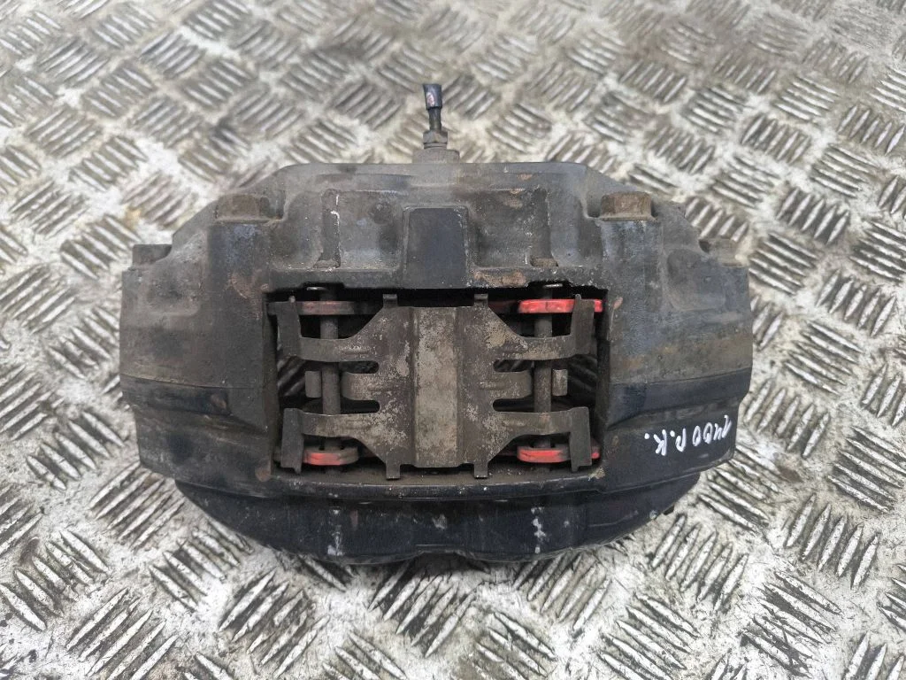 Front brake caliper – left