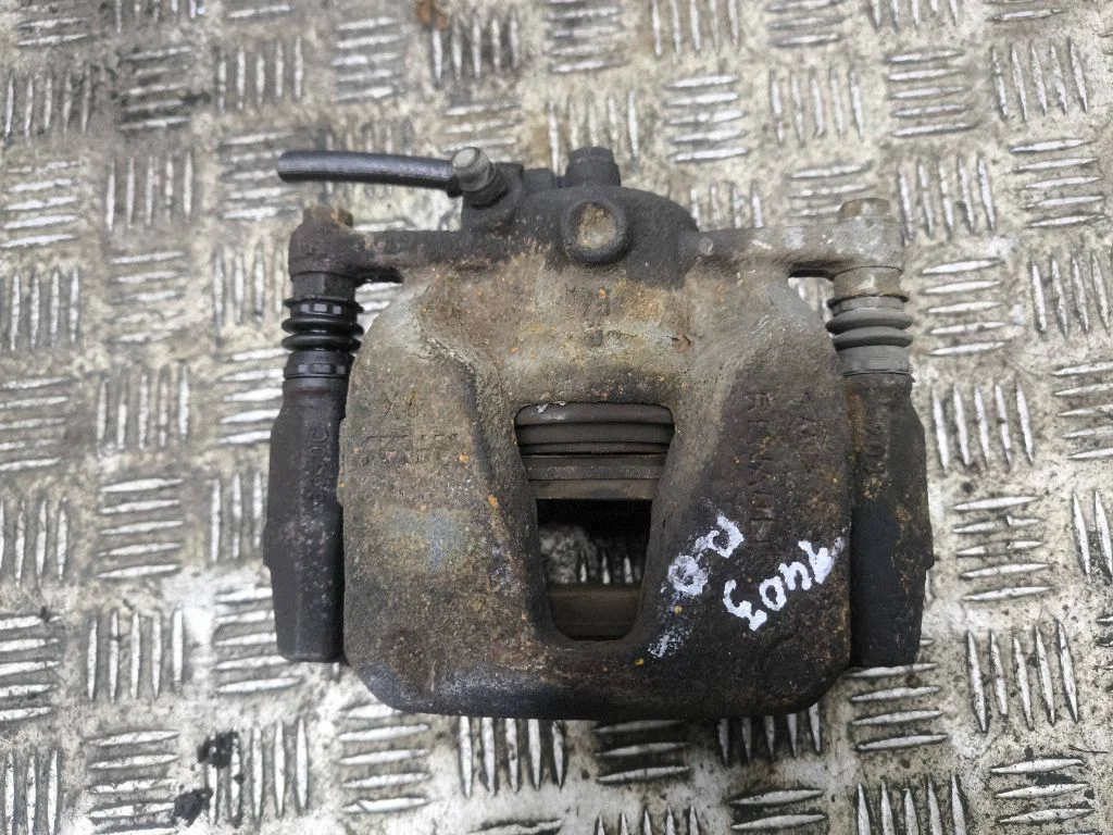Front brake caliper – right