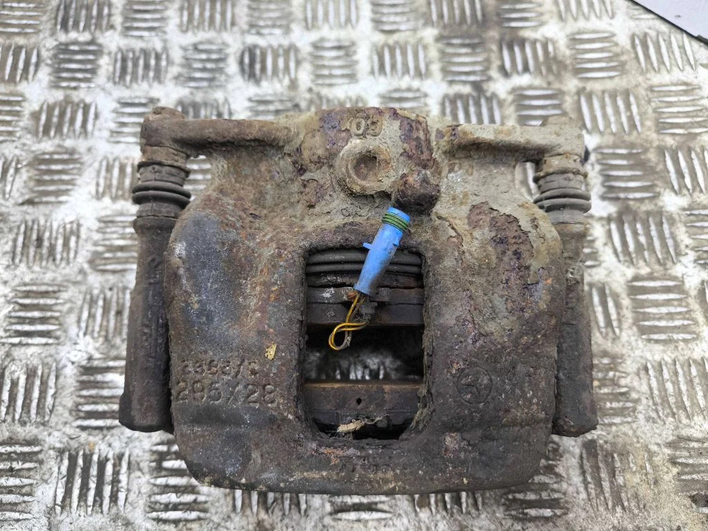 Front brake caliper A24638