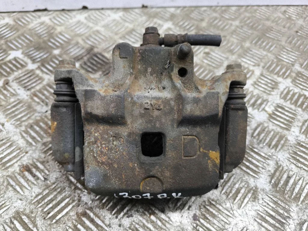 Front brake caliper – left