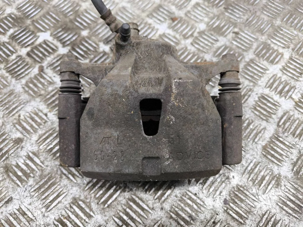 Front brake caliper – left