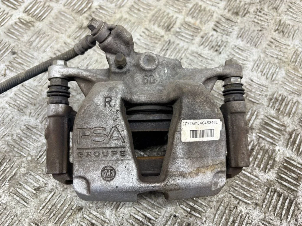 Front brake caliper – right