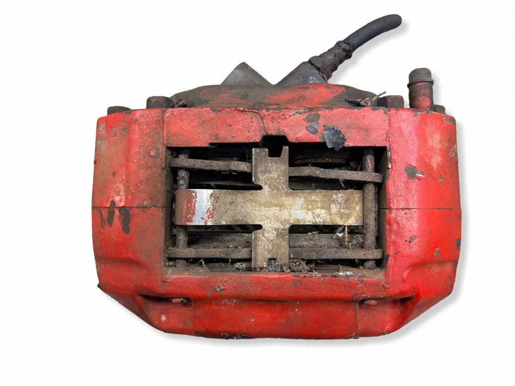 Front brake caliper – left