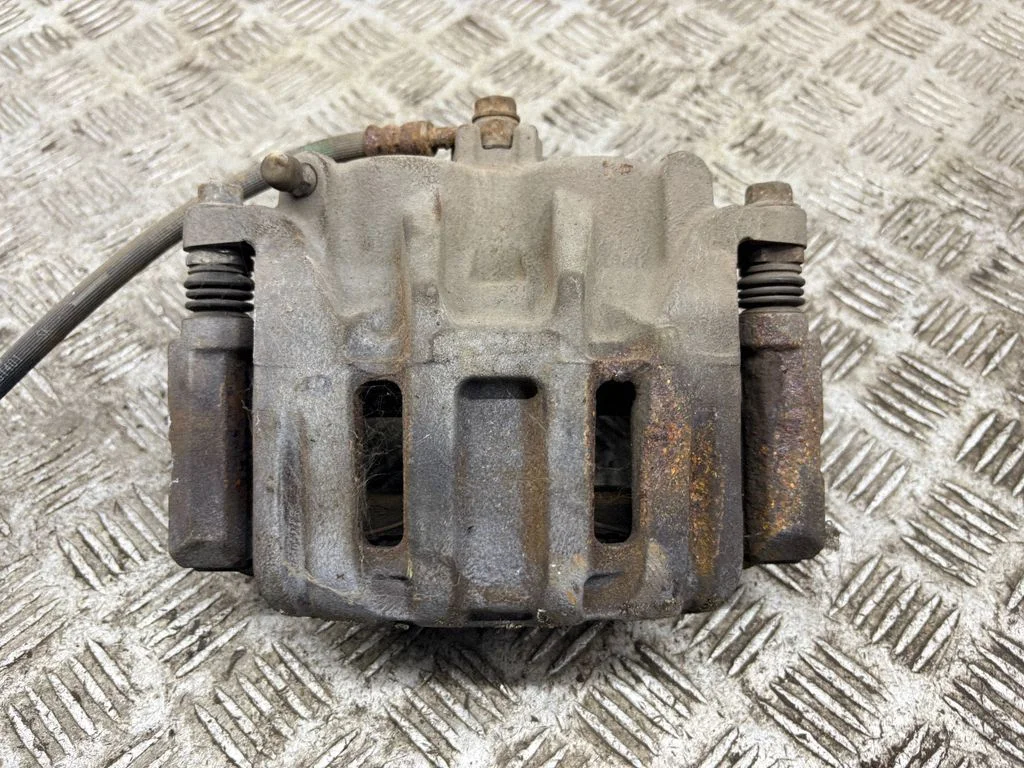 Front brake caliper – right