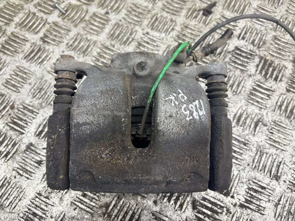 Front brake caliper – left