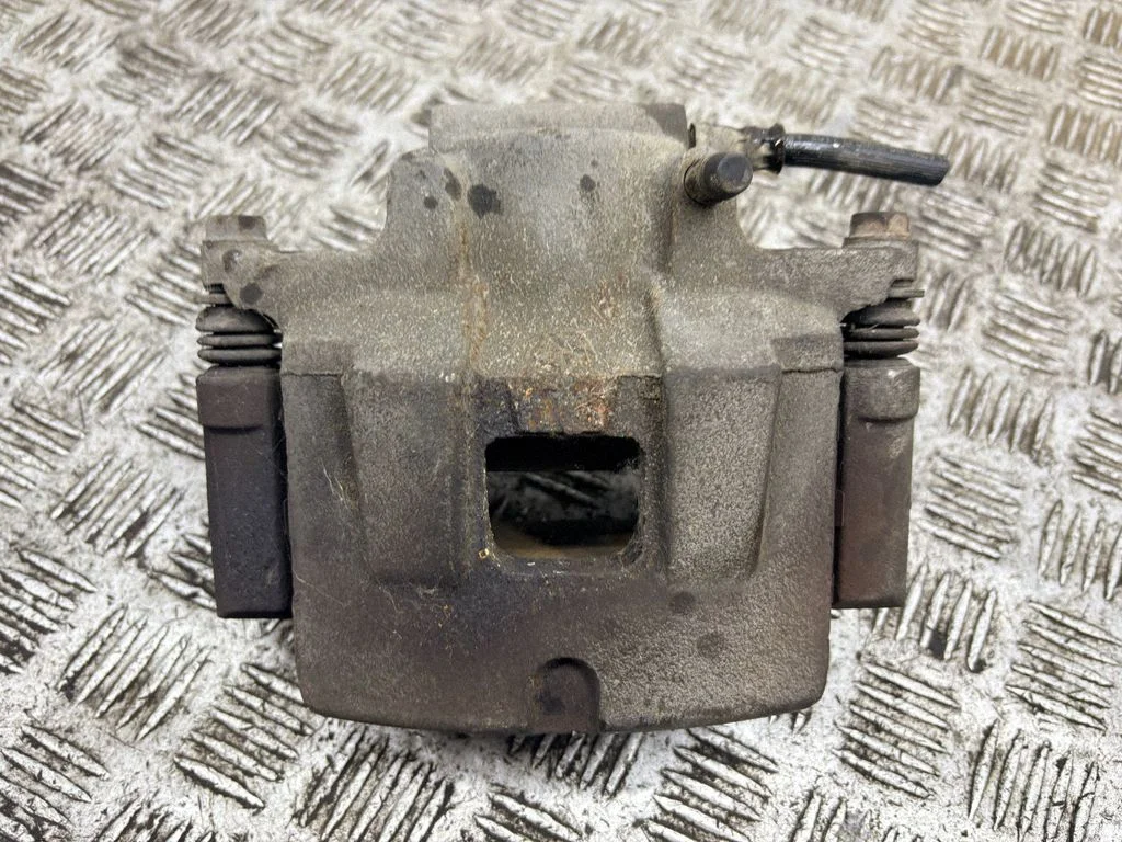 Front brake caliper – left