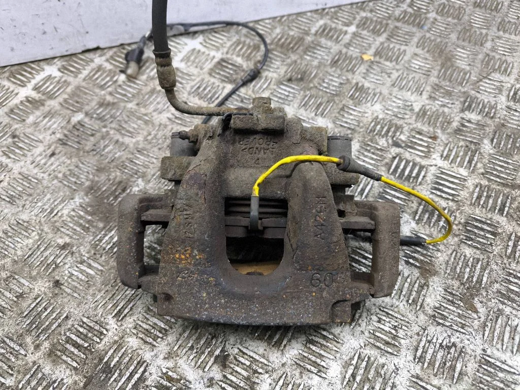 Front brake caliper – left