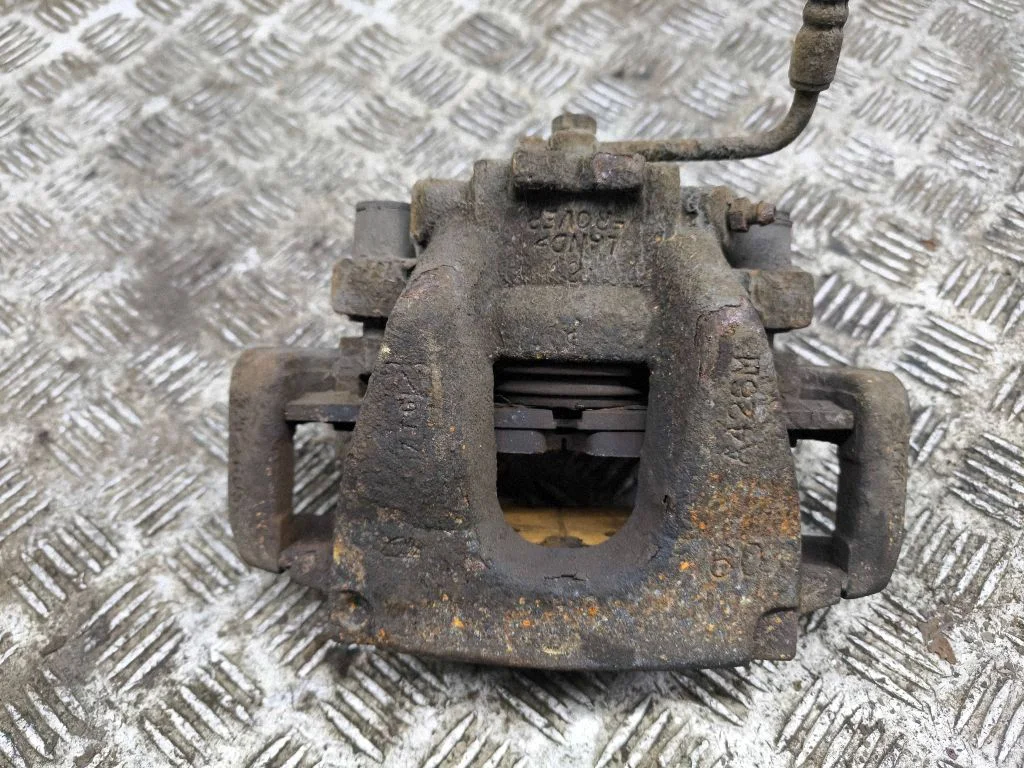 Front brake caliper – right
