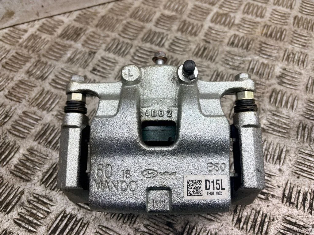 Front brake caliper – left