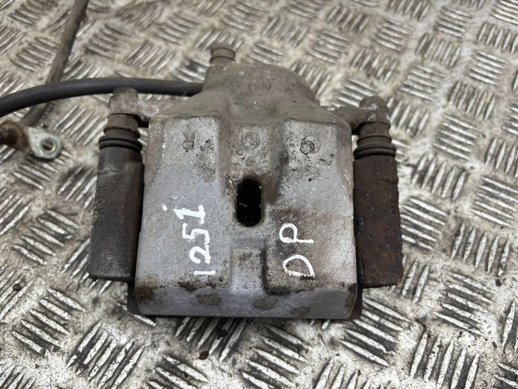 Front brake caliper – right