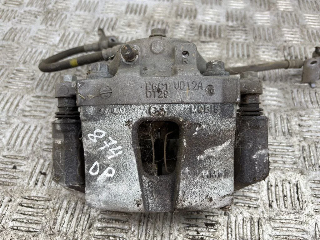 Front brake caliper – right