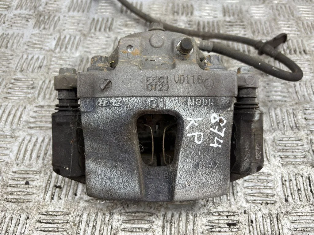 Front brake caliper – left