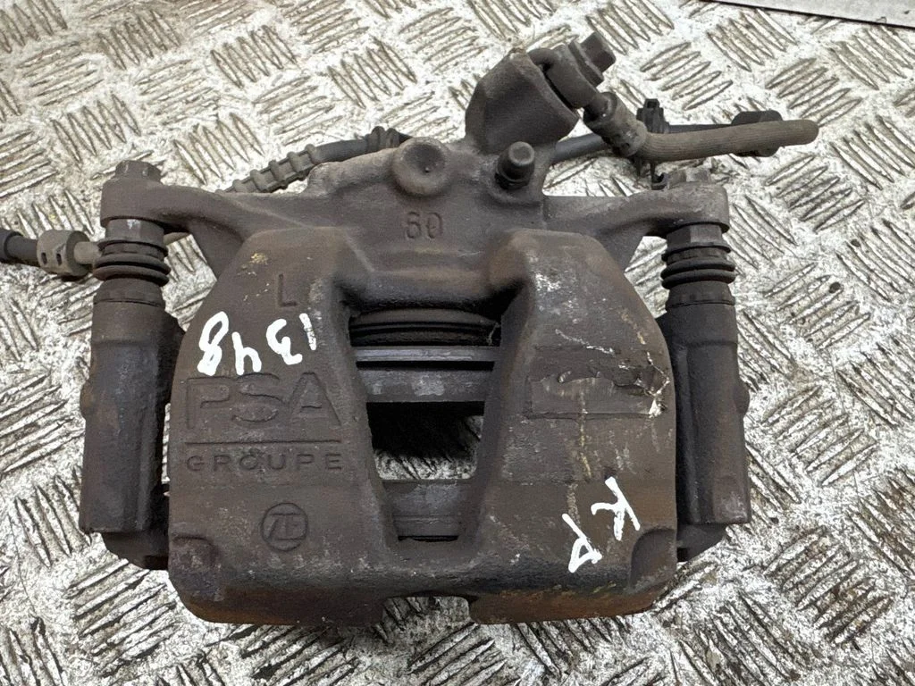 Front brake caliper – left