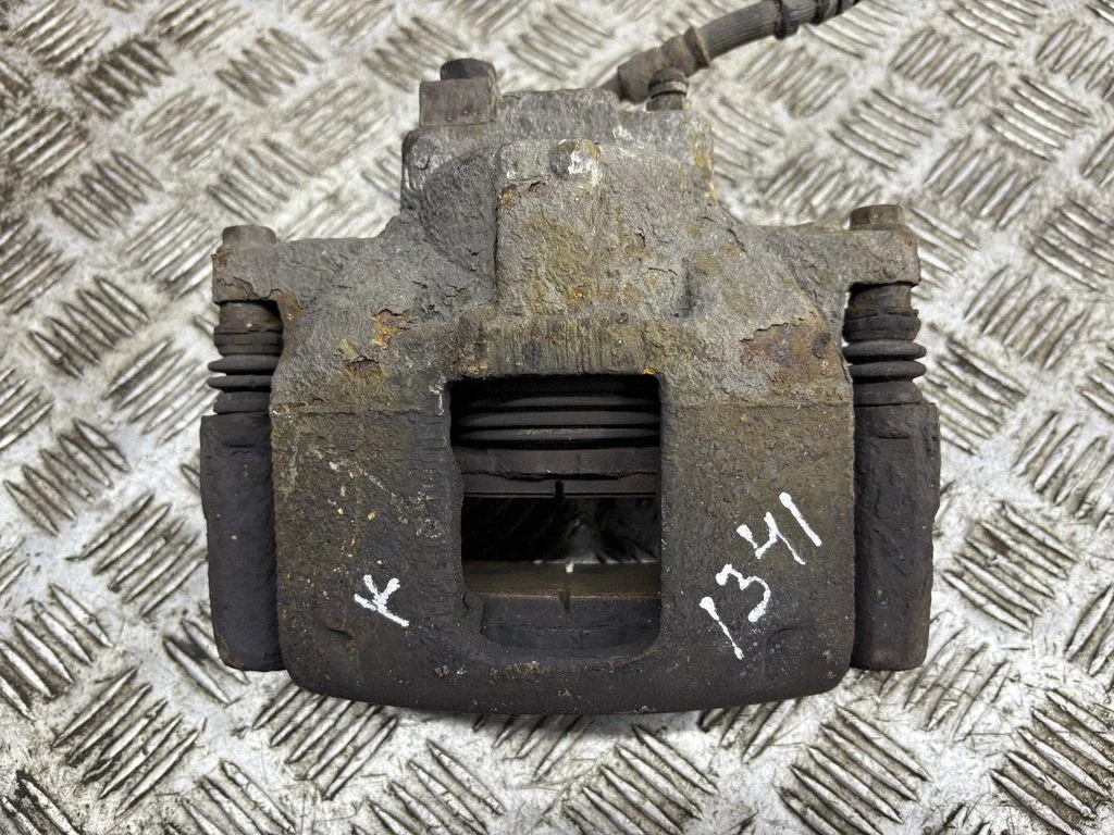 Front brake caliper – left