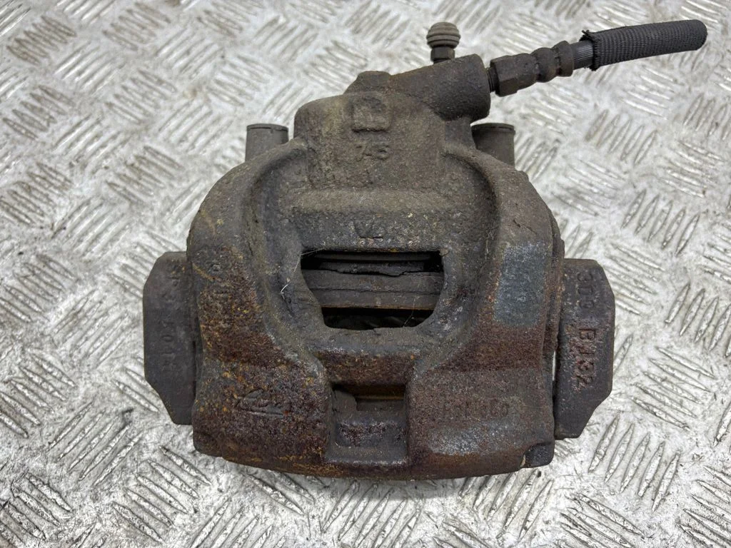 Front brake caliper – left