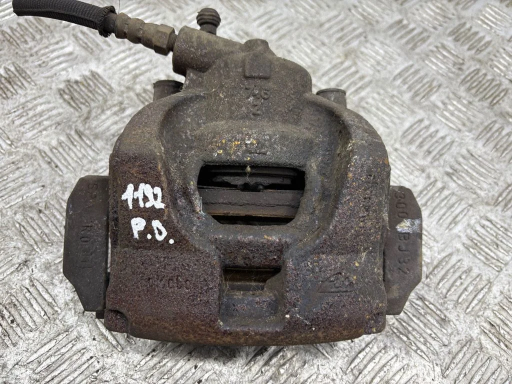 Front brake caliper – right