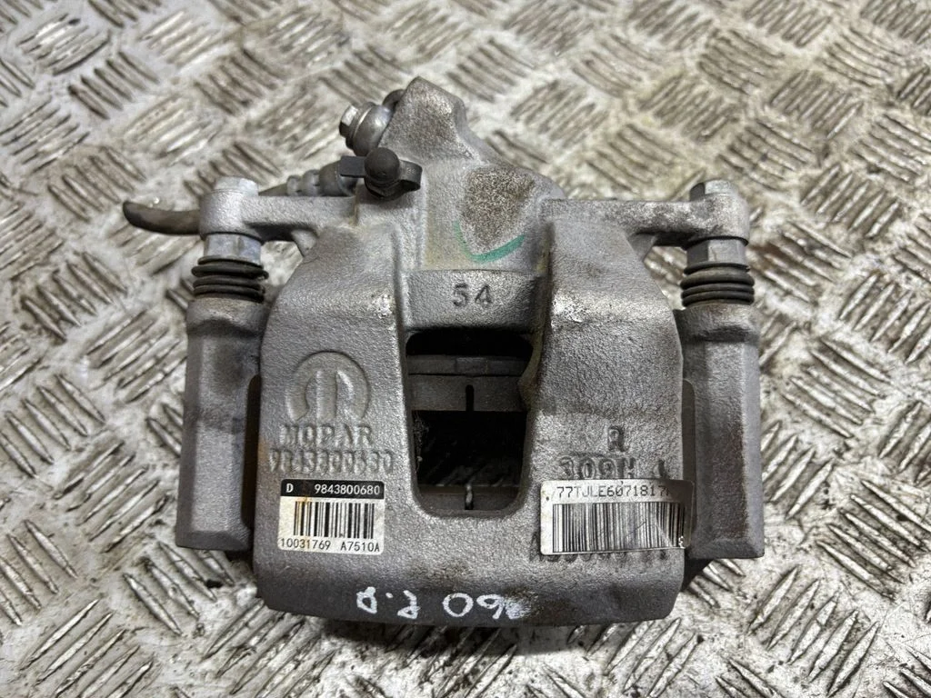Front brake caliper – right