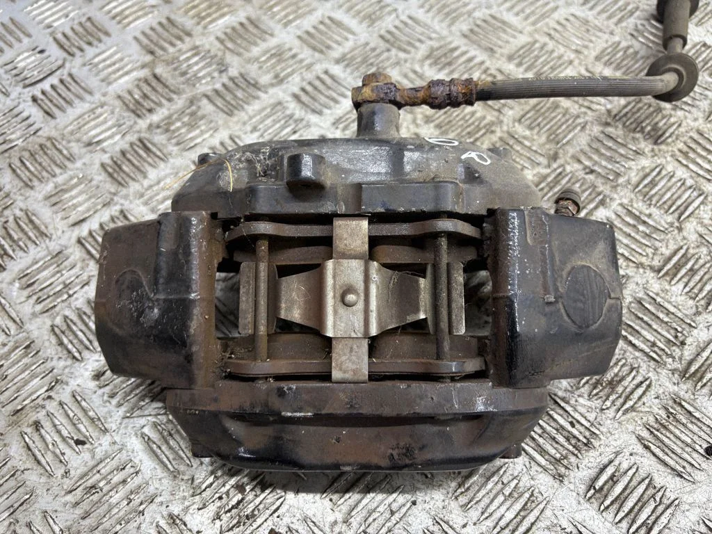 Front brake caliper – right