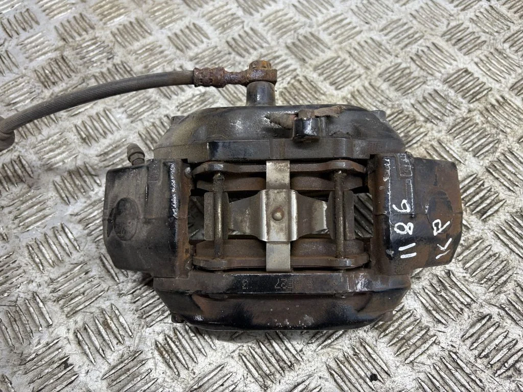 Front brake caliper – left