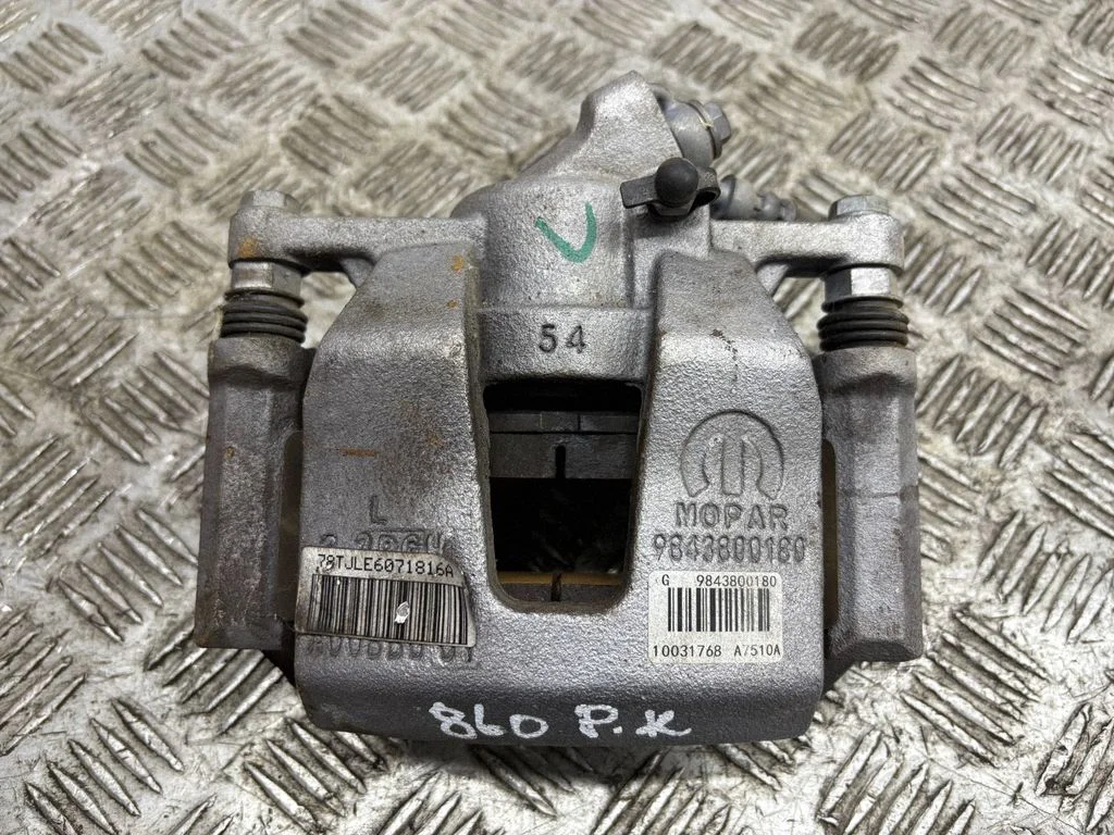 Front brake caliper – left