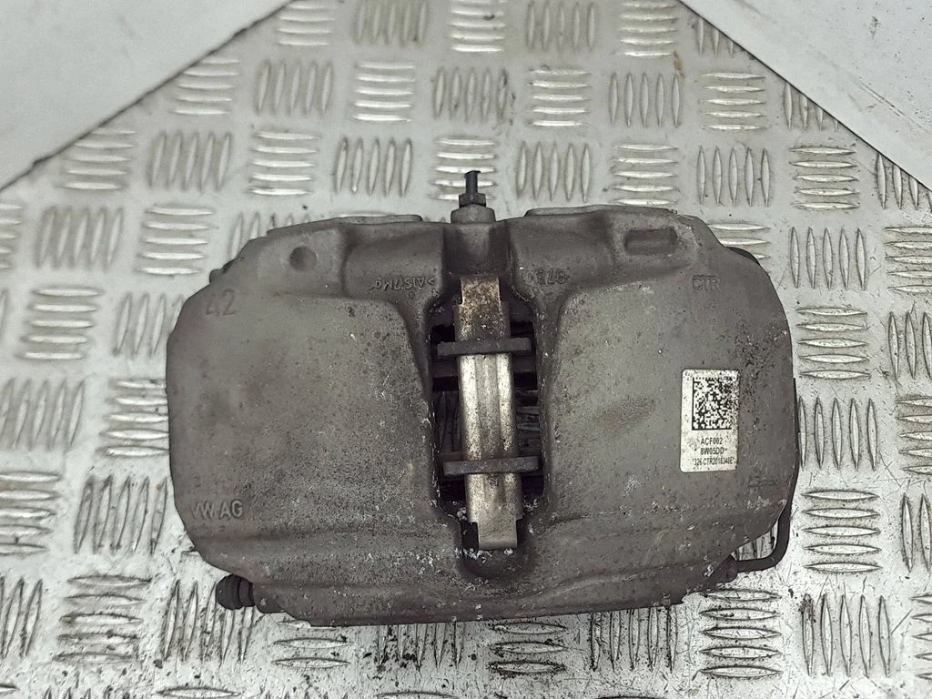 Front brake caliper – left