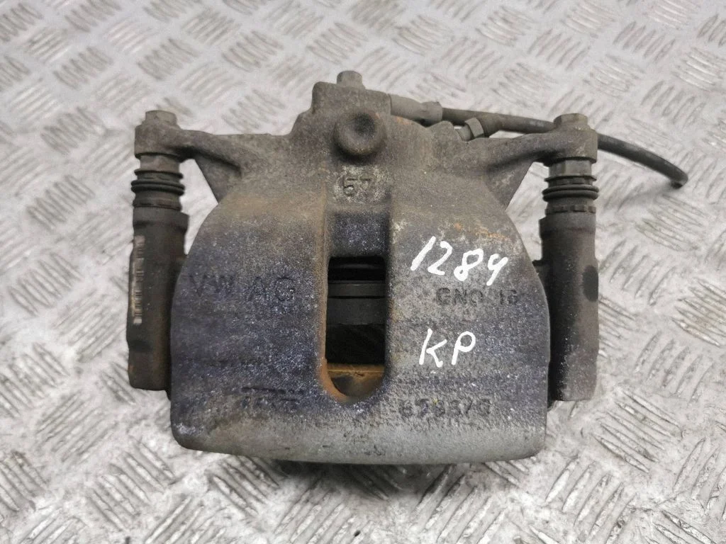 Front brake caliper – left