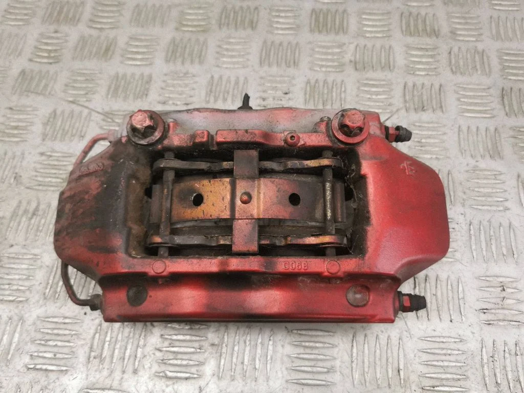 Front brake caliper – left