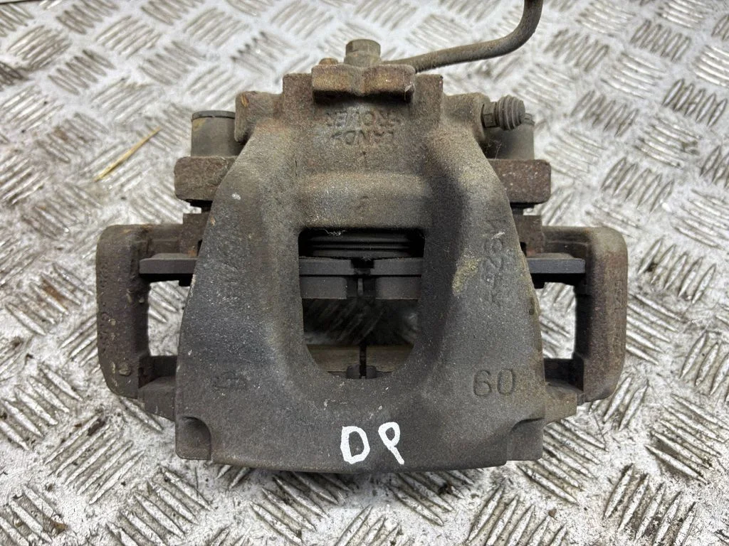 Front brake caliper – right
