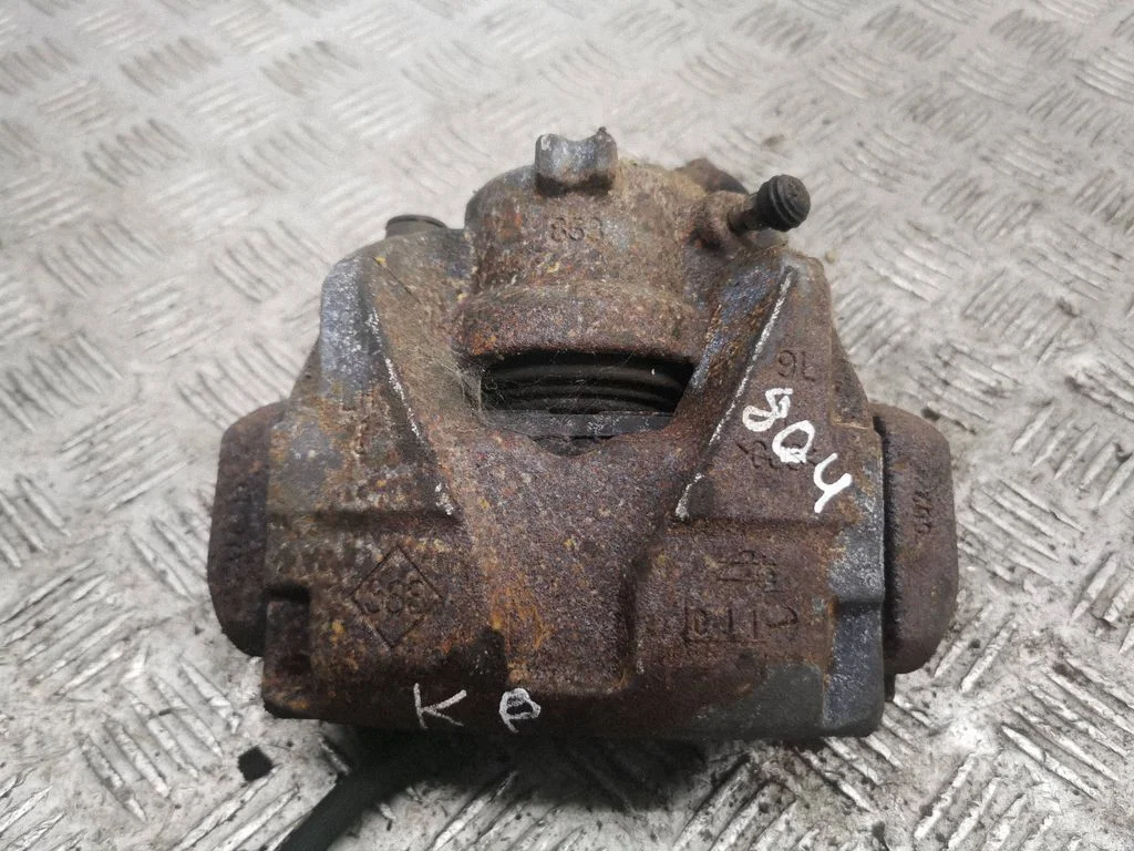 Front brake caliper – left