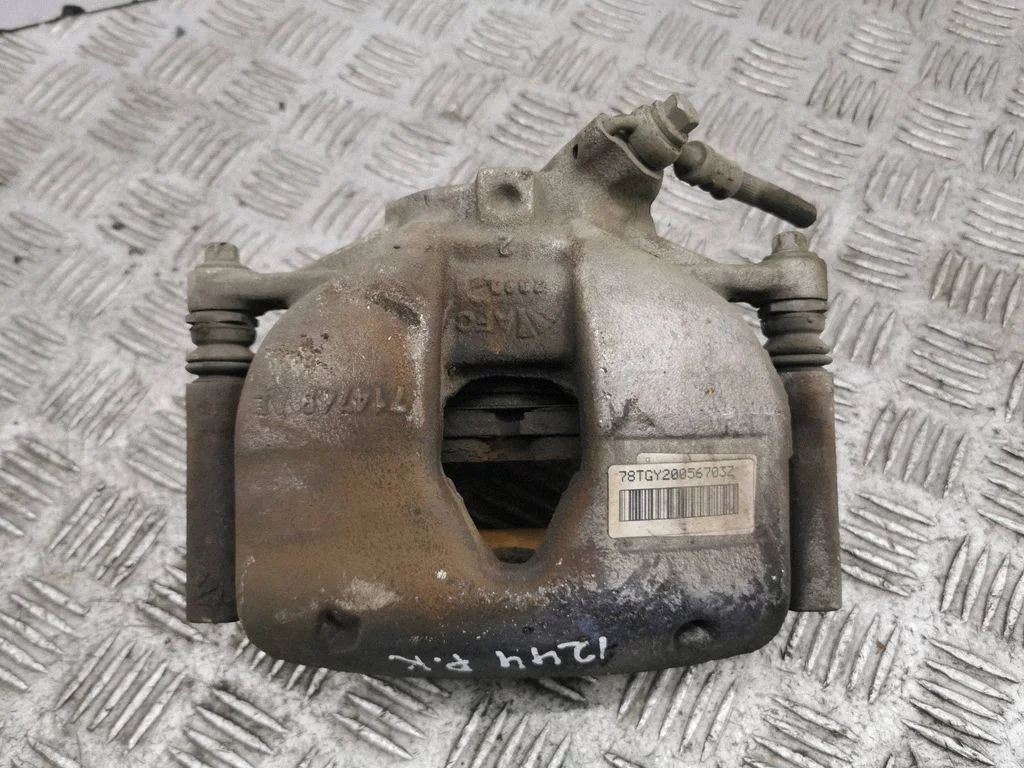 Front brake caliper – left