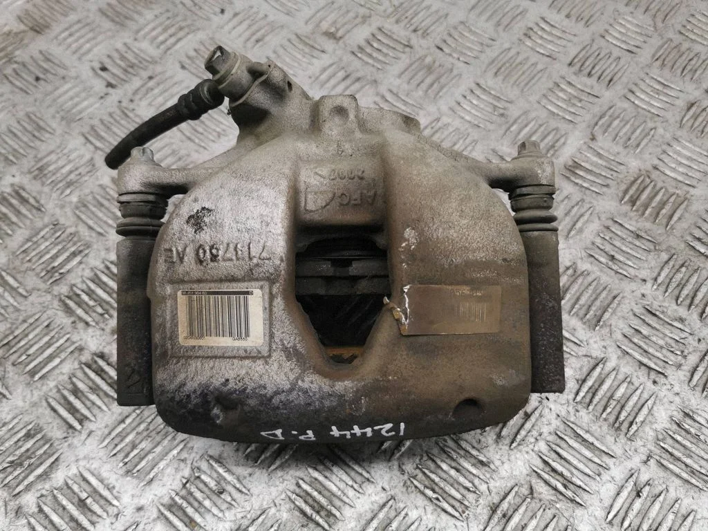 Front brake caliper – right
