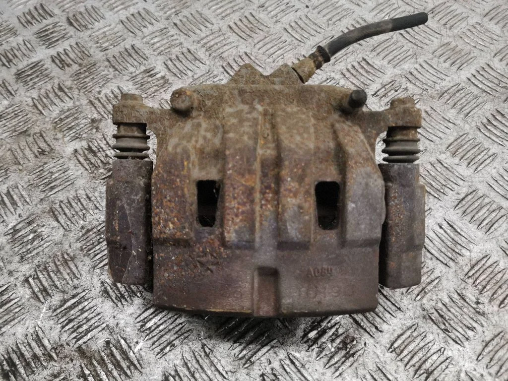 Front brake caliper – left