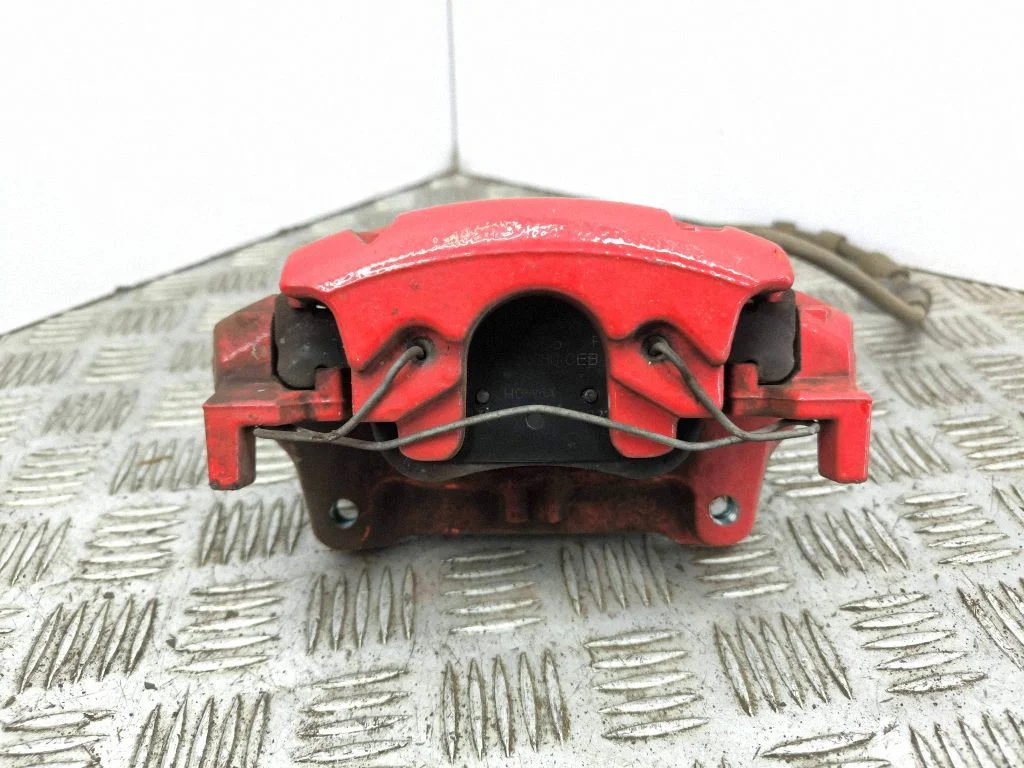Front brake caliper – left