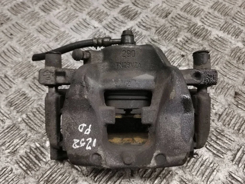 Front brake caliper – right