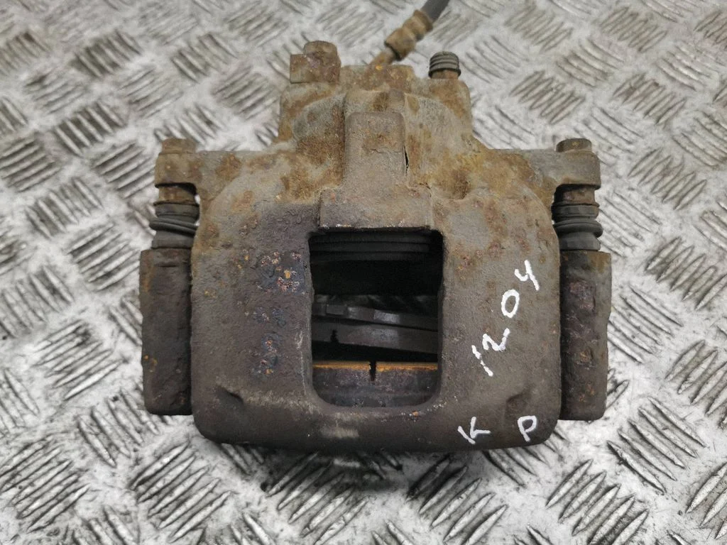 Front brake caliper – left