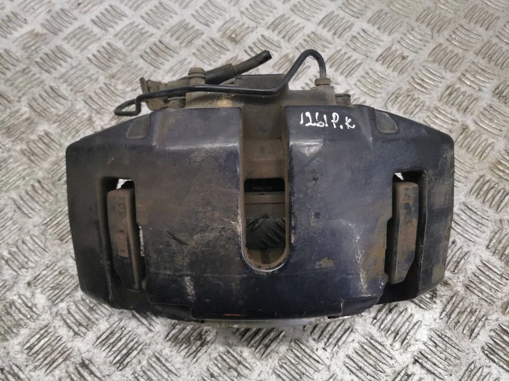 Front brake caliper – left