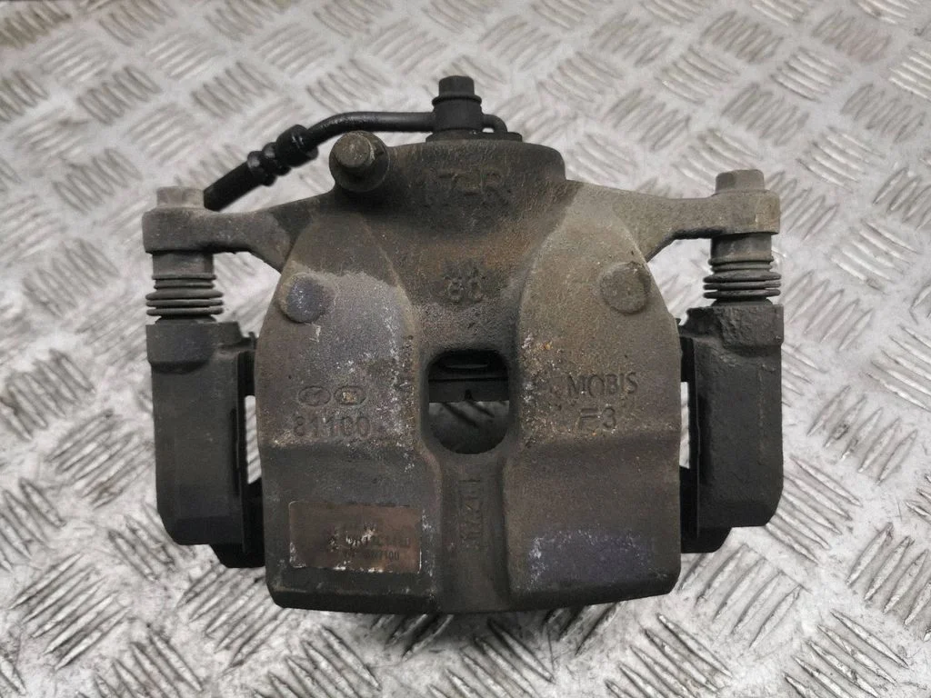 Front brake caliper – right
