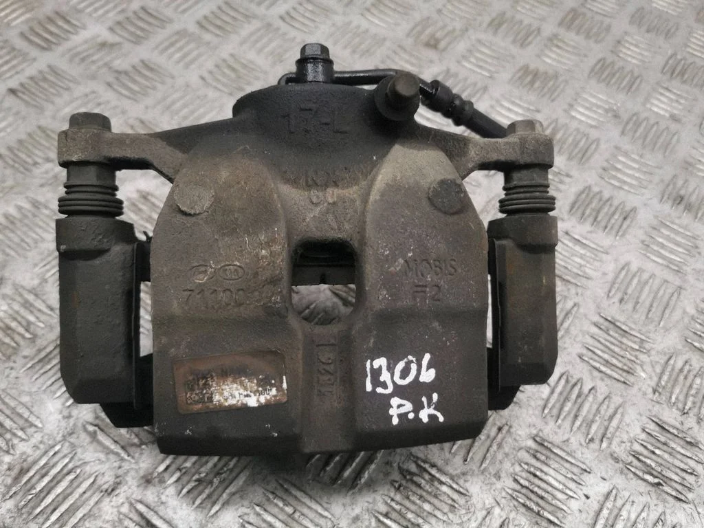 Front brake caliper – left