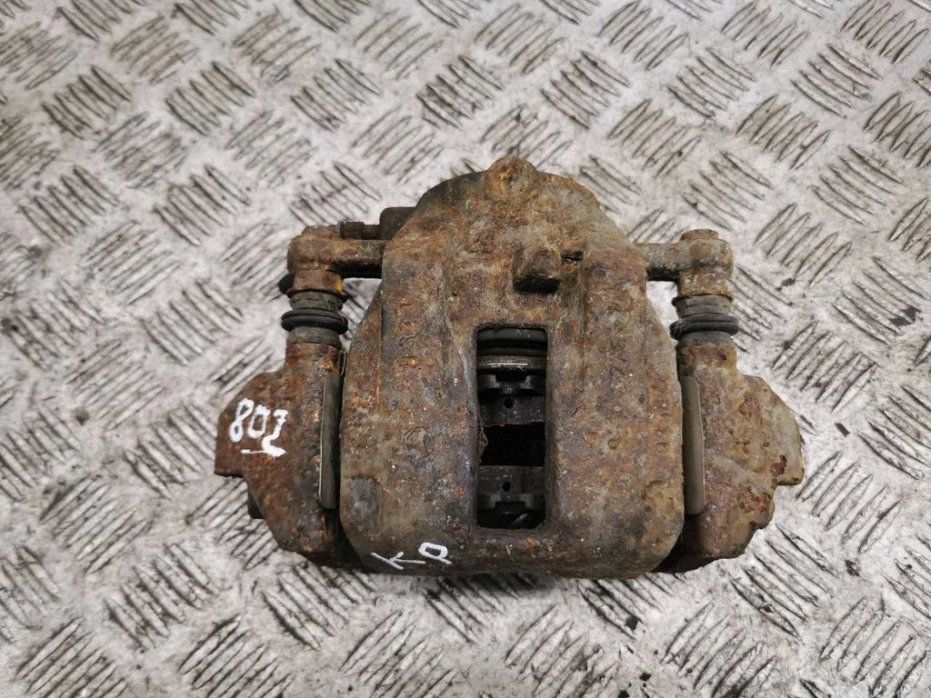 Front brake caliper – left