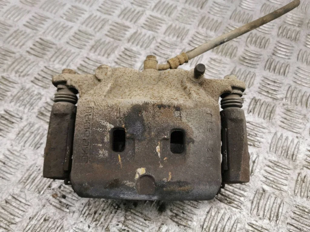 Front brake caliper – left