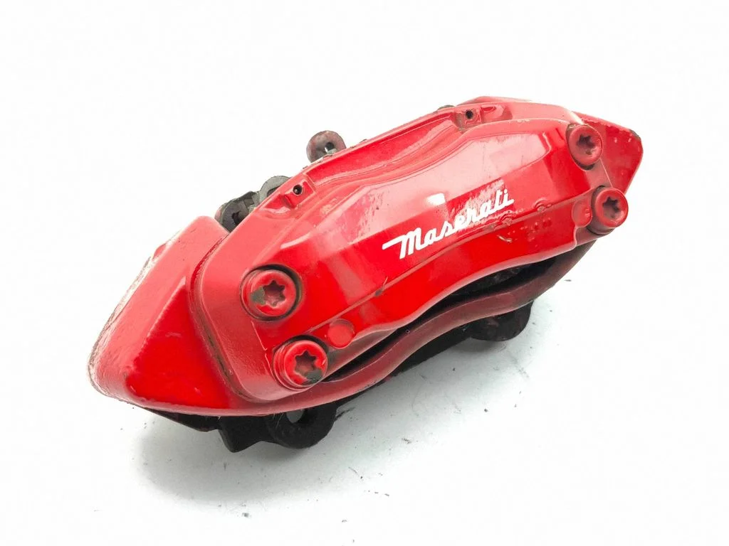 Front brake caliper – left