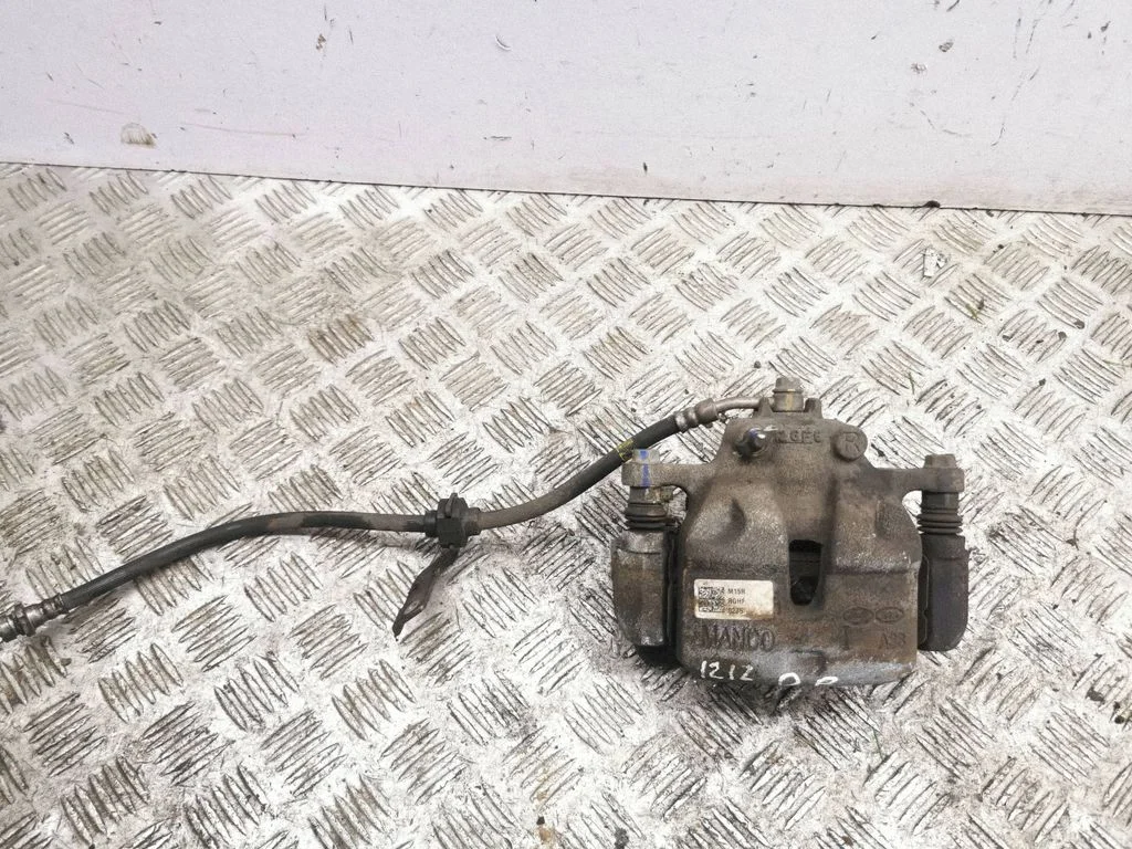Front brake caliper – right