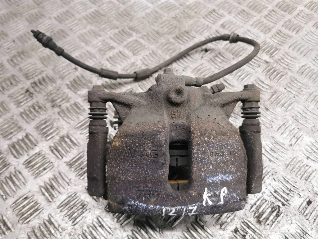 Front brake caliper – left