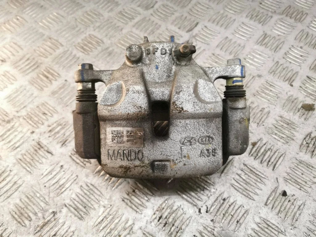 Front brake caliper – left