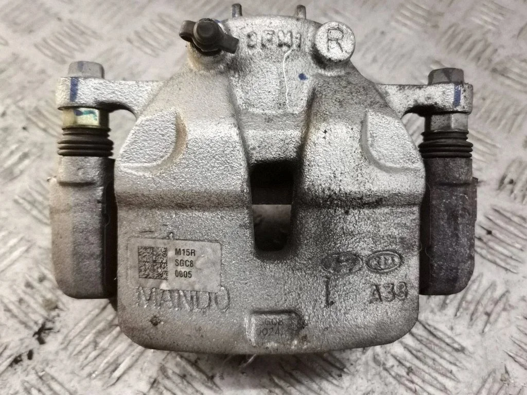 Front brake caliper – right