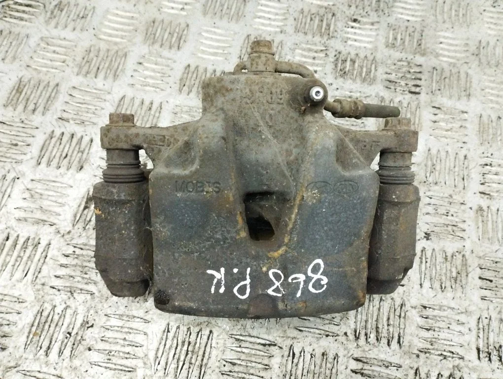 Front brake caliper – left